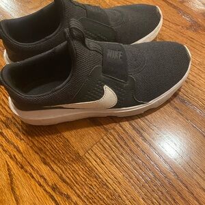 Nike Black Slip-On Mesh Sneakers with White Swoosh